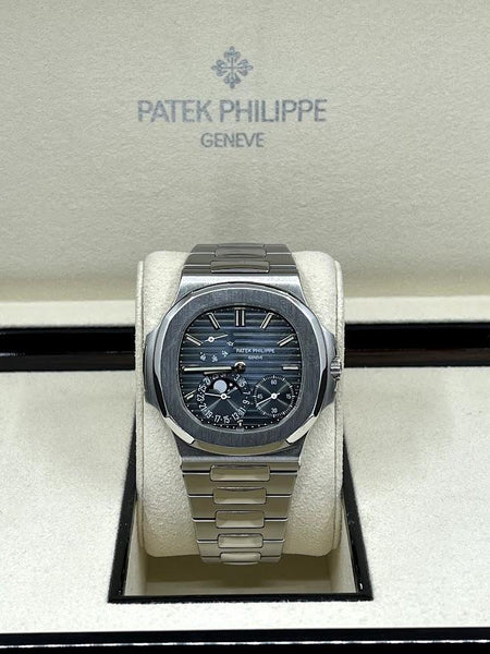 Patek Philippe Nautilus 5712/1A 40MM Blue Dial With Diamond Bezel - OMI  Jewelry