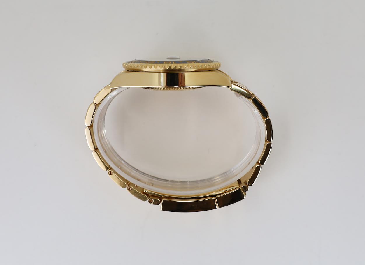 Rolex GMT-Master II Yellow Gold Green Dial Oyster Bracelet 116718LN