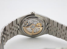 Load image into Gallery viewer, Rolex Land-Dweller 40 White Gold Oystersteel Intense White Honeycomb Motif Dial Fluted Bezel Flat Jubilee Bracelet 127334 - 2025