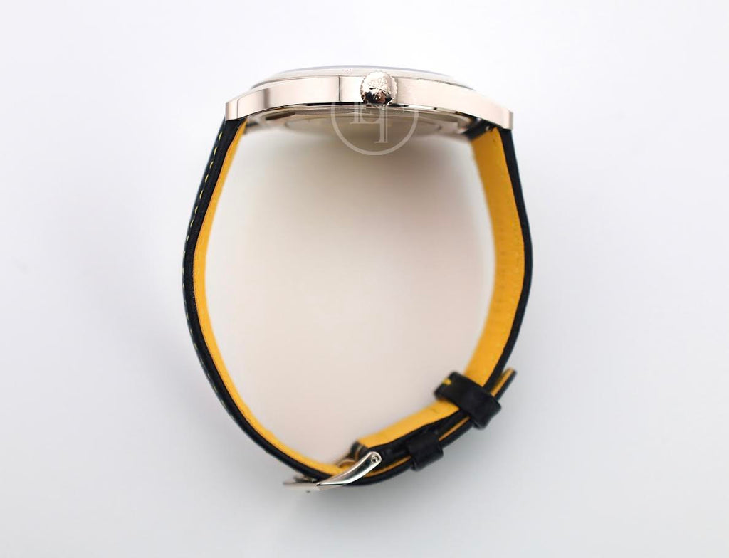 Patek Philippe Calatrava Date Sweep Seconds White Gold Black Carbon Motif Yellow Dial | 6007G-001