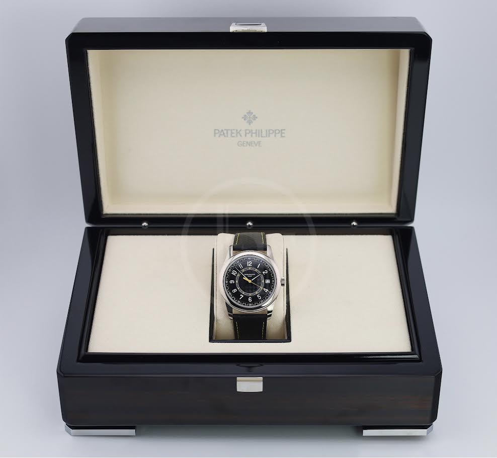 Patek Philippe Calatrava Date Sweep Seconds White Gold Black Carbon Motif Yellow Dial | 6007G-001