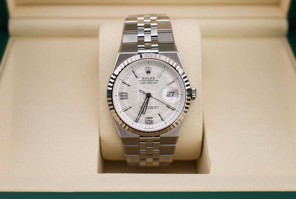 Rolex Land-Dweller 40 White Gold Oystersteel Intense White Honeycomb Motif Dial Fluted Bezel Flat Jubilee Bracelet 127334 - 2025