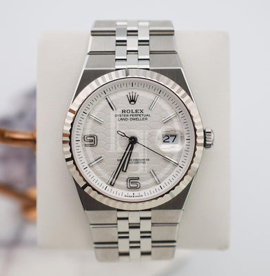 Rolex Land-Dweller 40 White Gold Oystersteel Intense White Honeycomb Motif Dial Fluted Bezel Flat Jubilee Bracelet 127334 - 2025