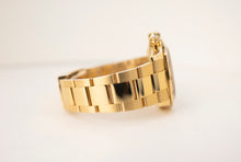 Load image into Gallery viewer, Rolex Daytona Yellow Gold Green Index Dial Yellow Gold Bezel Oyster Bracelet 116508