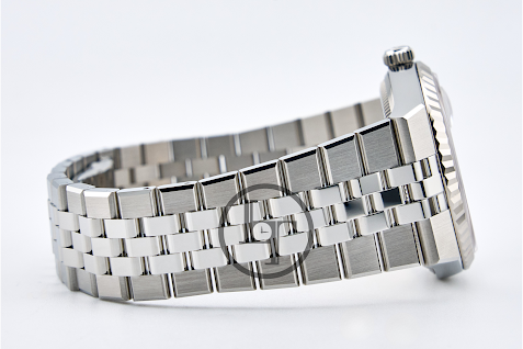 Rolex Land-Dweller 36 White Gold Oystersteel Intense White Honeycomb Motif Dial Fluted Bezel Flat Jubilee Bracelet 127234 - 2025