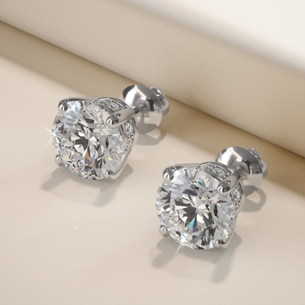 Brilliant Stud Earrings with Side Diamonds Diamond with 1.04 ct. (2X0.50 ct. center diamonds) - Luxury Time NYC