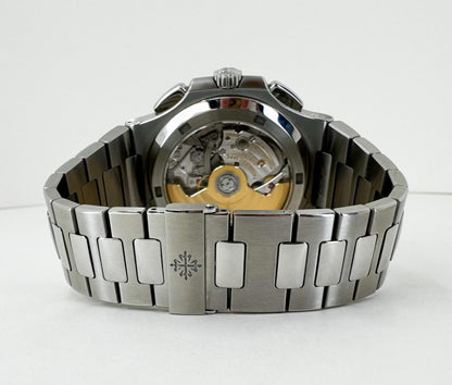 Patek Philippe 40.5mm Nautilus Travel Time Chronograph Watch Black Dial 5990/1A - Luxury Time NYC