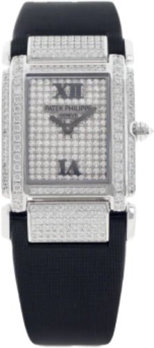 Patek Philippe Twenty~4 Ladies Medium 31 x 30mm Baguette Diamond Roman White Gold Diamond Set Quartz | 4911G - 001 - Luxury Time NYC