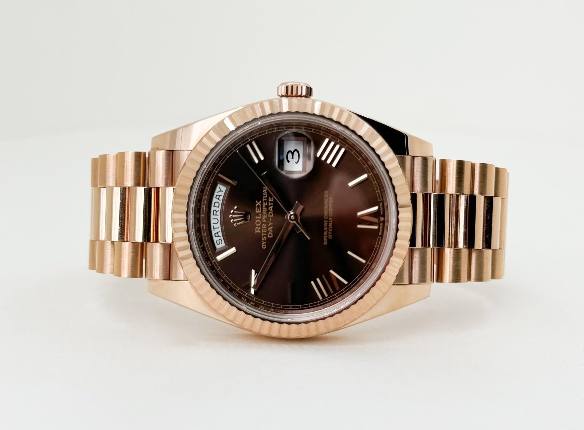 Rolex Day-Date 40 Rose Gold Chocolate Roman Dial & Fluted Bezel President Bracelet 228235 - Luxury Time NYC