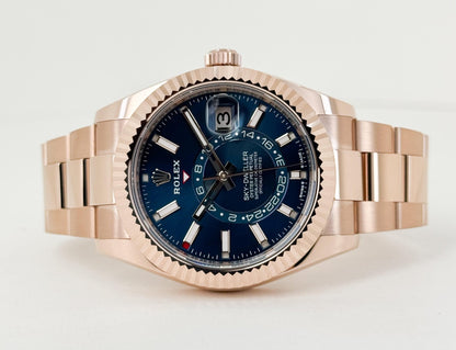 Rolex Everose Gold Sky-Dweller Watch - Fluted Ring Command Bezel - Blue-Green Index Dial - Oyster Bracelet - Luxury Time NYC