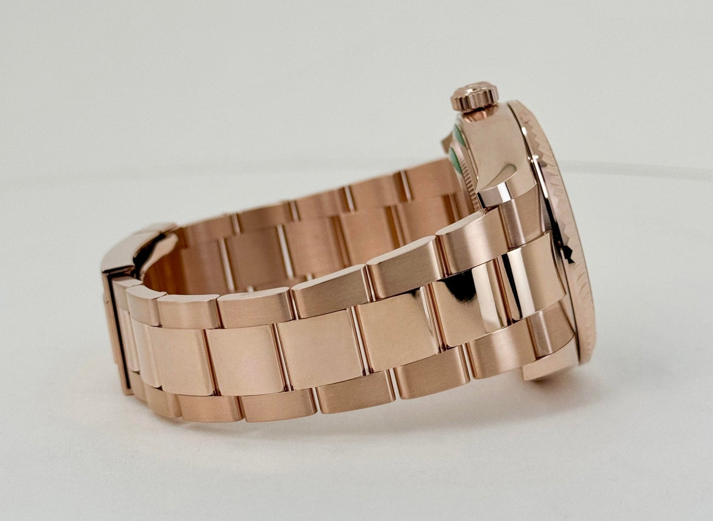 Rolex Everose Gold Sky-Dweller Watch - Fluted Ring Command Bezel - Blue-Green Index Dial - Oyster Bracelet - Luxury Time NYC