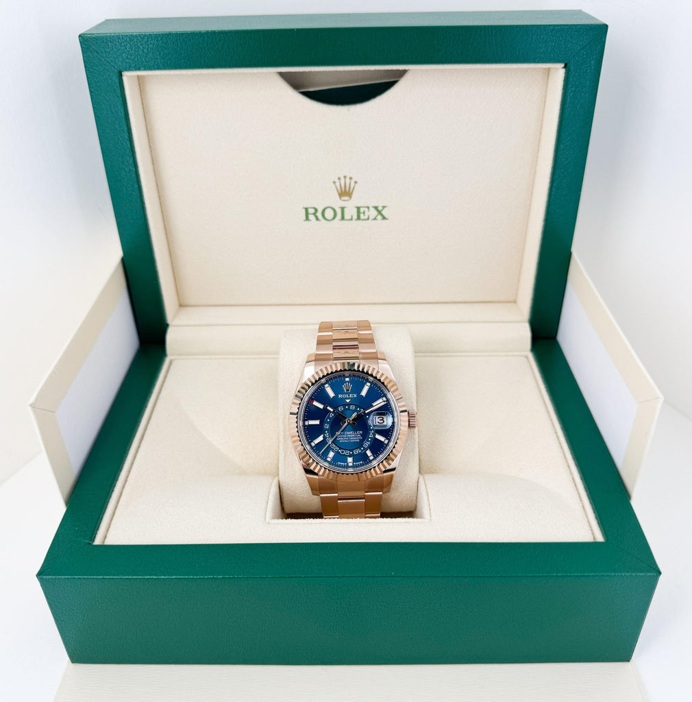 Rolex Everose Gold Sky-Dweller Watch - Fluted Ring Command Bezel - Blue-Green Index Dial - Oyster Bracelet - Luxury Time NYC