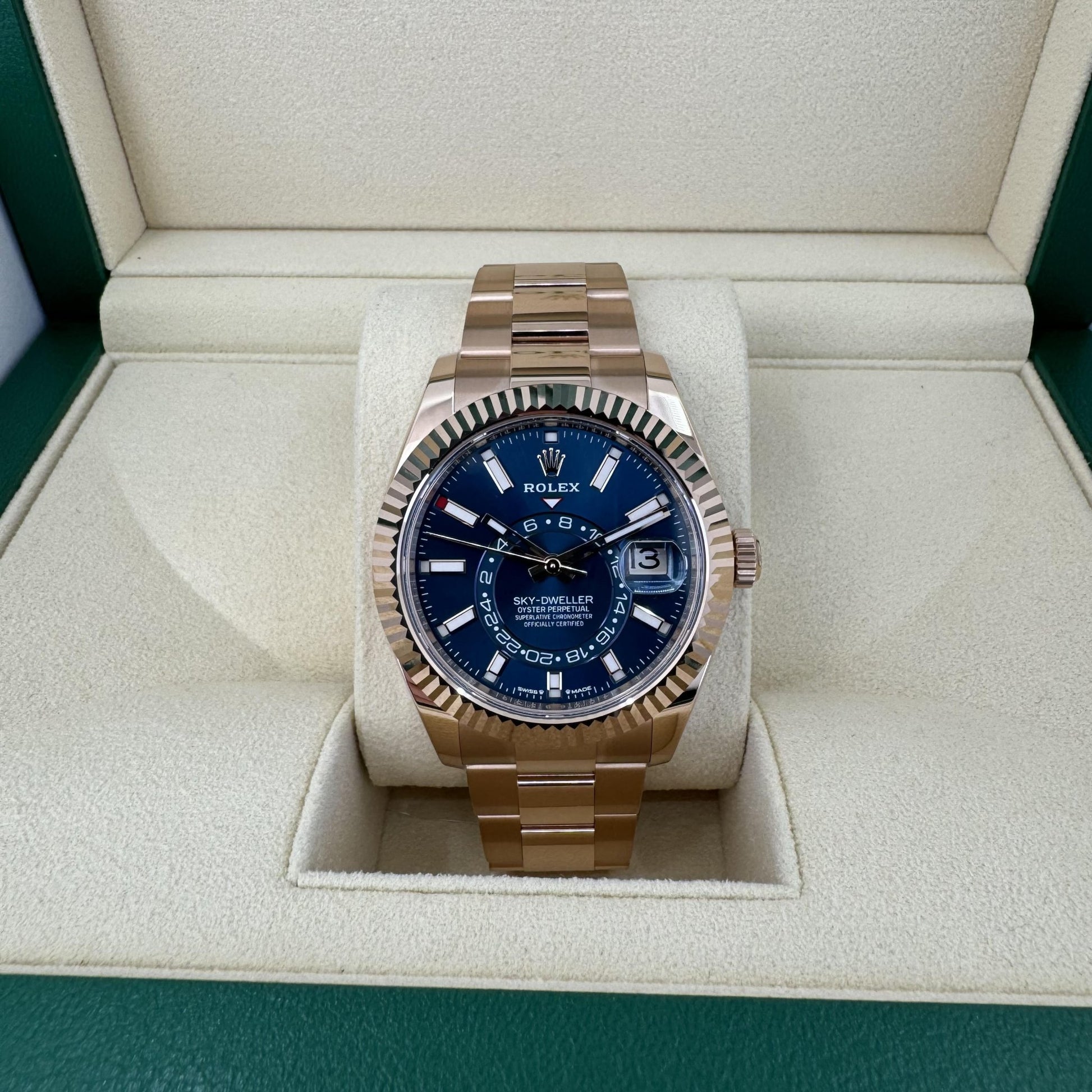 Rolex Everose Gold Sky-Dweller Watch - Fluted Ring Command Bezel - Blue-Green Index Dial - Oyster Bracelet - Luxury Time NYC