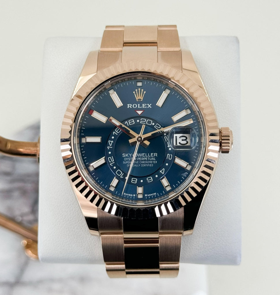 Rolex Everose Gold Sky-Dweller Watch - Fluted Ring Command Bezel - Blue-Green Index Dial - Oyster Bracelet - Luxury Time NYC