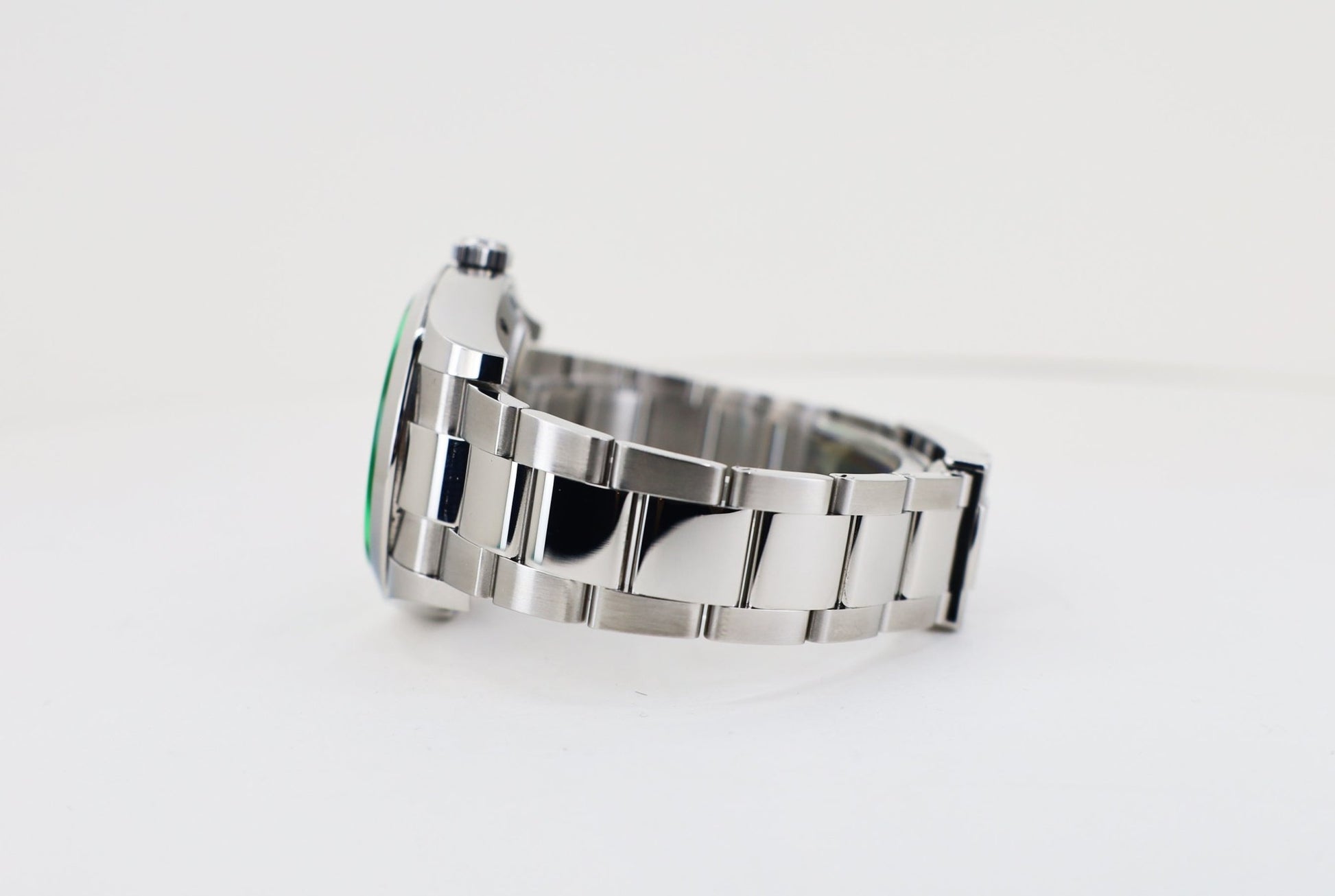 Rolex Milgauss Green Crystal Stainless Steel Black Dial Smooth Bezel Oyster Bracelet 116400GV - Luxury Time NYC