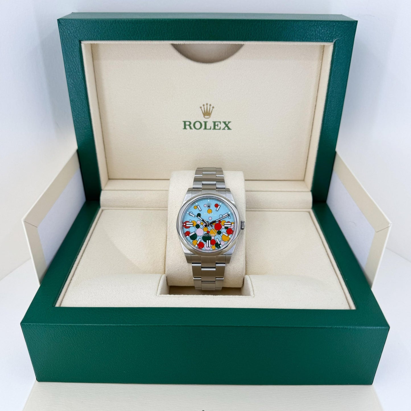 Rolex Oyster Perpetual 41 Watch - Domed Bezel - Turquoise Blue Celebration Motif Index Dial - Oyster Bracelet - 124300 - Luxury Time NYC