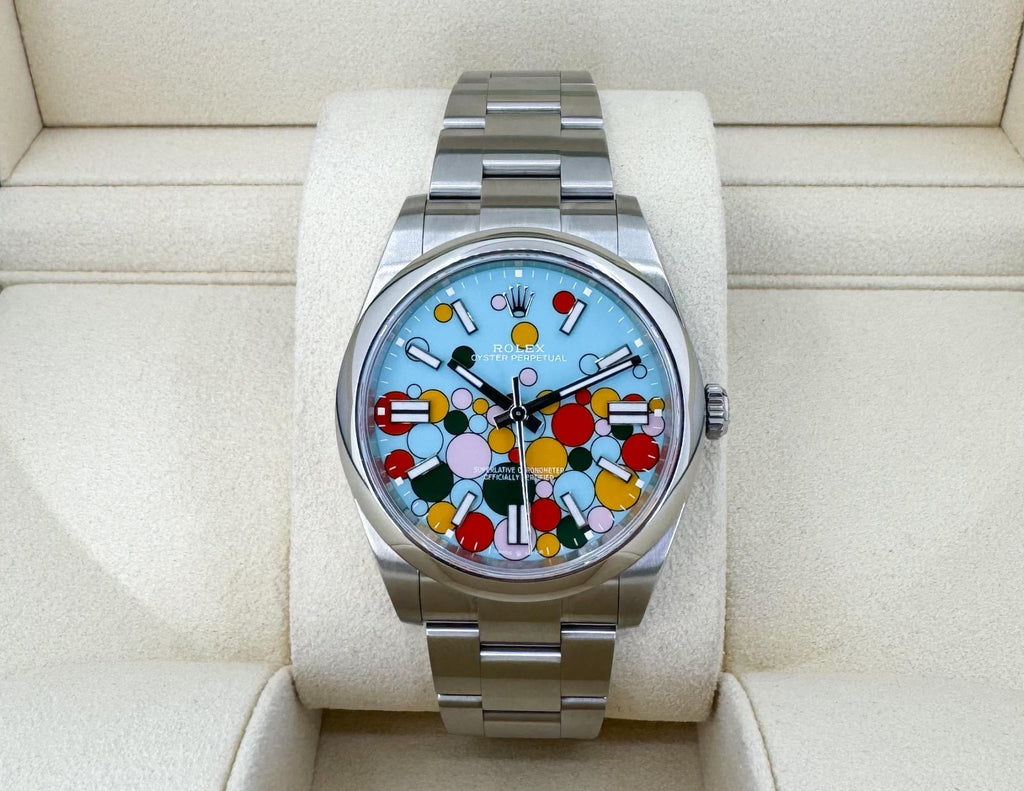 Rolex Oyster Perpetual 41 Watch - Domed Bezel - Turquoise Blue Celebration Motif Index Dial - Oyster Bracelet - 124300 - Luxury Time NYC