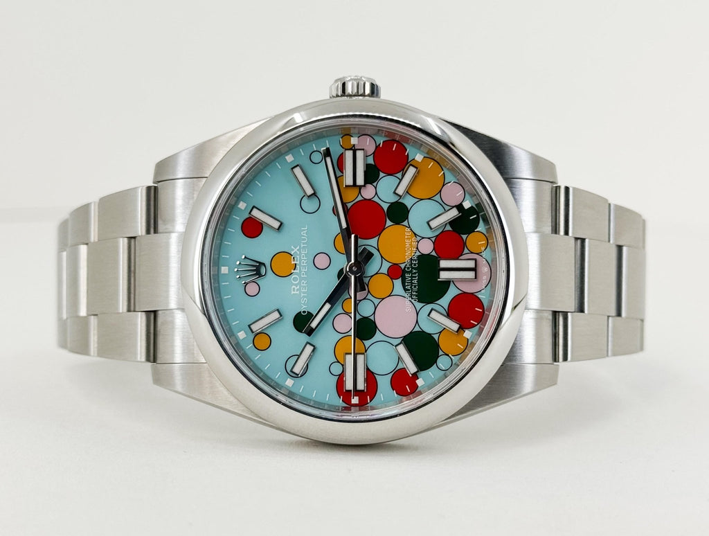 Rolex Oyster Perpetual 41 Watch - Domed Bezel - Turquoise Blue Celebration Motif Index Dial - Oyster Bracelet - 124300 - Luxury Time NYC