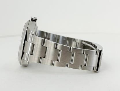 Rolex Oyster Perpetual 41 Watch - Domed Bezel - Turquoise Blue Celebration Motif Index Dial - Oyster Bracelet - 124300 - Luxury Time NYC