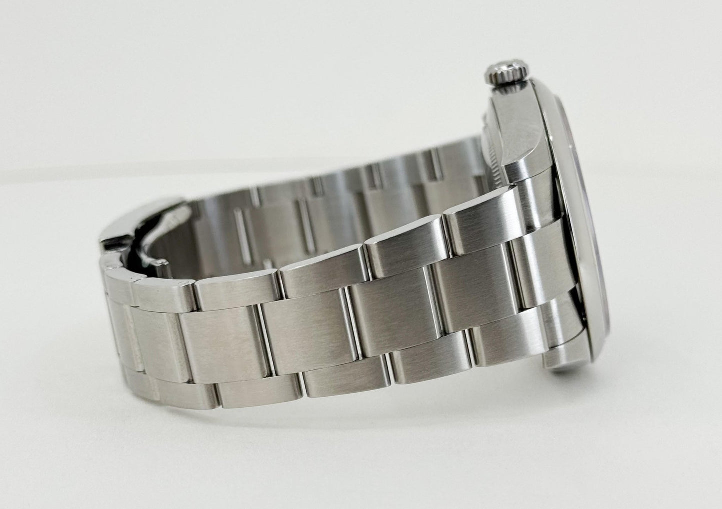 Rolex Oyster Perpetual 41 Watch - Domed Bezel - Turquoise Blue Celebration Motif Index Dial - Oyster Bracelet - 124300 - Luxury Time NYC