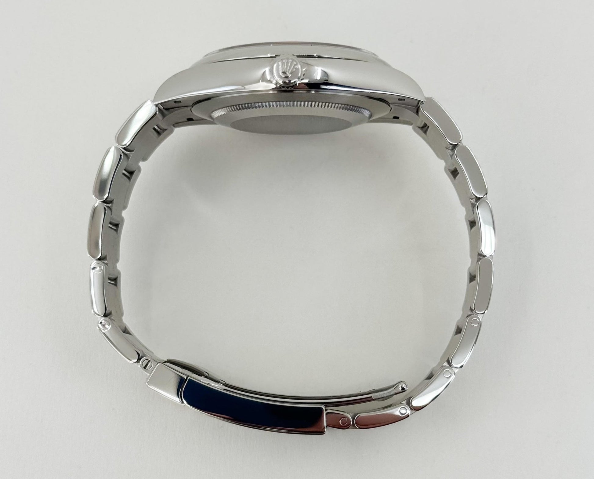 Rolex Oyster Perpetual 41 Watch - Domed Bezel - Turquoise Blue Celebration Motif Index Dial - Oyster Bracelet - 124300 - Luxury Time NYC