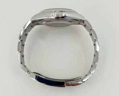 Rolex Oyster Perpetual 41 Watch - Domed Bezel - Turquoise Blue Celebration Motif Index Dial - Oyster Bracelet - 124300 - Luxury Time NYC