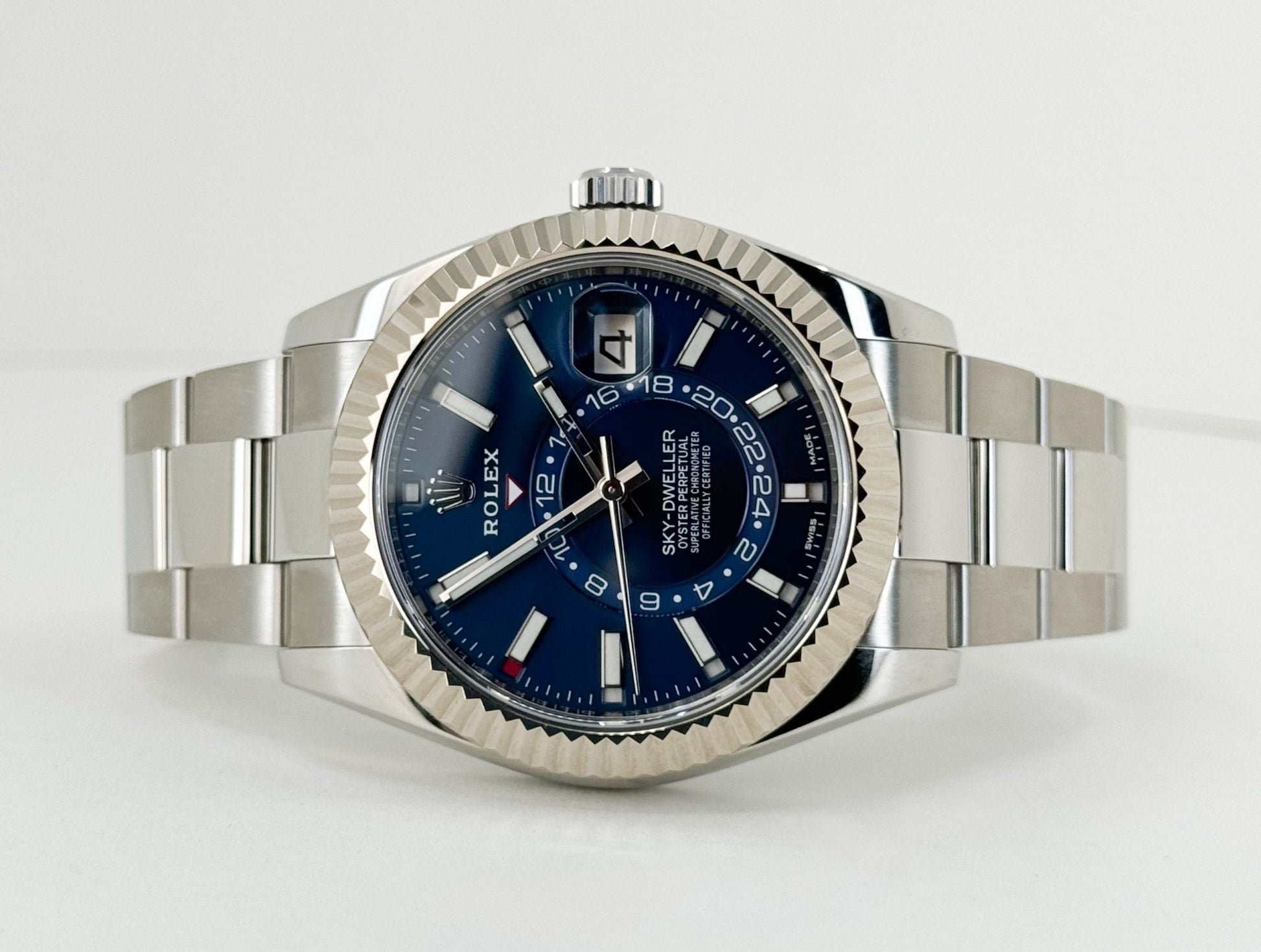 Rolex Sky-Dweller Stainless Steel Blue Index Dial Fluted White Gold Bezel Oyster Bracelet 326934 - Luxury Time NYC
